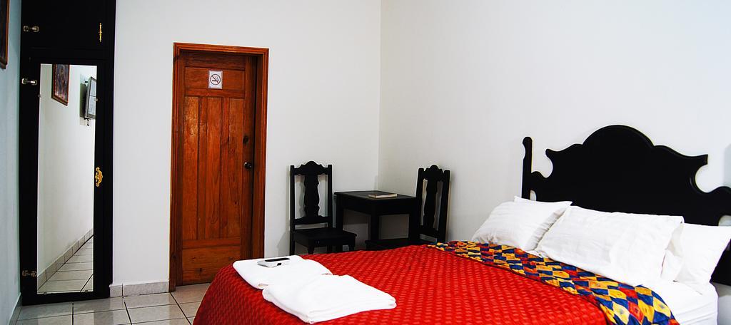Uw Oasis Hotel La Ceiba Pokoj fotografie