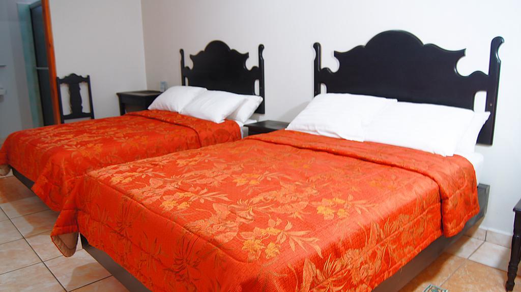 Uw Oasis Hotel La Ceiba Pokoj fotografie
