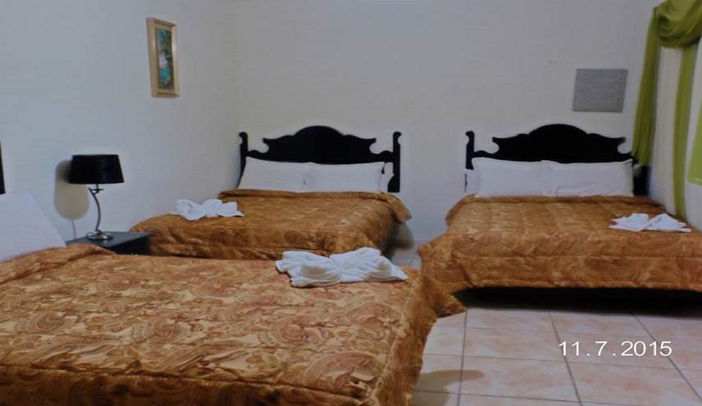 Uw Oasis Hotel La Ceiba Pokoj fotografie